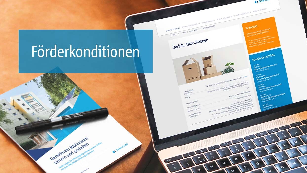 WEG-Broschüre und -Website auf Laptop: Darlehenskonditionen für Wohnungseigentümergemeinschaften