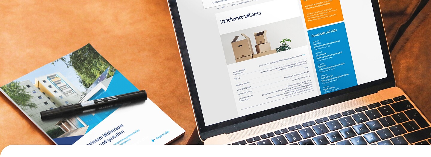 Laptop: Downloadcenter zu Mietwohnraumförderungen der BayernLabo