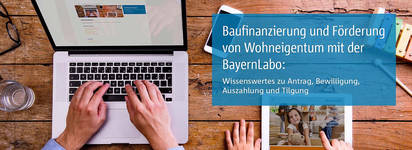 Bannerbild Förderwissen Eigenwohnraumförderung | BayernLabo Förderwissen auf Notebook zur Beantwortung von Fragen rundum die Bau- und Wohnraumfinanzierung der BayernLabo.